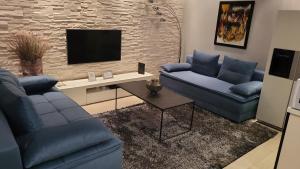 Posedenie v ubytovaní APARTMENT AMBER s podzemnom garažom