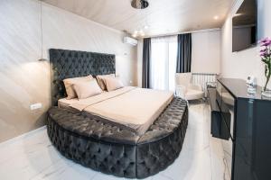 A bed or beds in a room at Luxury Martina apartment