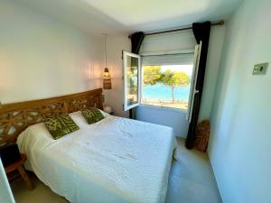 Almadrava Paradise et Eden客房内的一张或多张床位