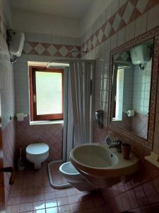 Koupelna v ubytování Agriturismo Tholos