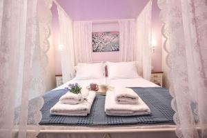 Ένα ή περισσότερα κρεβάτια σε δωμάτιο στο Dream Luxury Home +42 φωτογραφίες