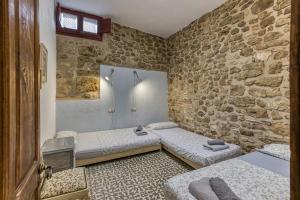 Ένα ή περισσότερα κρεβάτια σε δωμάτιο στο Casa Blava