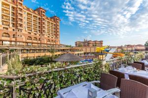 a view of the resort from the balcony of a restaurant at Villa Side Residence in Side