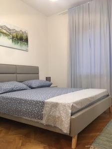Postel nebo postele na pokoji v ubytování Apartment Nela