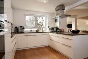 A cozinha ou cozinha compacta de Design Apartment in Eppelheim