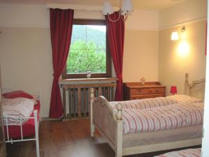 Postel nebo postele na pokoji v ubytování Chalet Catton Four bedroom appartement near Bad Kleinkirchheim