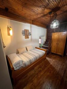 Postel nebo postele na pokoji v ubytování El Refugio del Busgosu