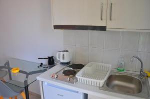 Kuchyň nebo kuchyňský kout v ubytování Dimitra Apartments