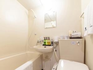 Koupelna v ubytování HOTEL LiVEMAX BUDGET Nippori