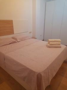 Posteľ alebo postele v izbe v ubytovaní Apartamento Fabricio