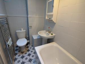 Ένα μπάνιο στο Hoxton/Shoreditch Rooms