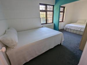 Ένα ή περισσότερα κρεβάτια σε δωμάτιο στο Hoxton/Shoreditch Rooms