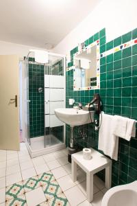 Kúpeľňa v ubytovaní Albergo Villa San Michele + 37 fotografií