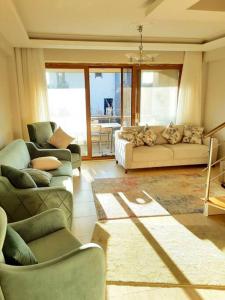 a living room with two couches and a couch at ERDEK in Erdek