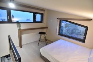Llit o llits en una habitació de Welcome Inn