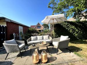 Ein Sitzbereich in der Unterkunft Ferienhaus Meergefühl