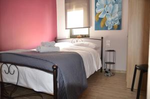 Ένα ή περισσότερα κρεβάτια σε δωμάτιο στο Persefoni's Home