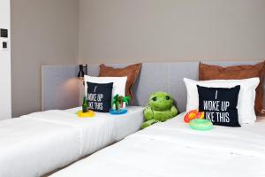 Posteľ alebo postele v izbe v ubytovaní Moxy Vienna City East