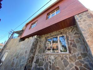 a building with a stained glass window on it at REAL FAMILY APART new in Soğuksu