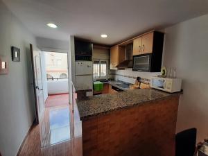Kuchyňa alebo kuchynka v ubytovaní Apartamento Las Gaviotas