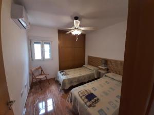 Posteľ alebo postele v izbe v ubytovaní Apartamento Las Gaviotas