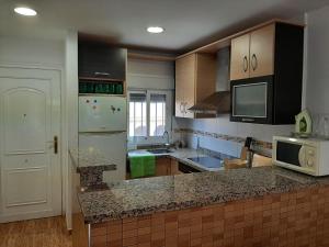 Kuchyňa alebo kuchynka v ubytovaní Apartamento Las Gaviotas