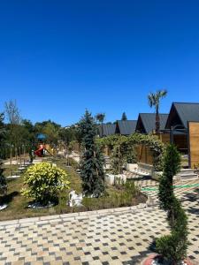 a park with trees and plants and a pathway at 7Sense Nature Resort in Sapanca