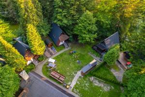an overhead view of a backyard with a tent at Domki Brenna Leśnica in Brenna