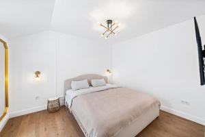 Voodi või voodid majutusasutuse Villa Chou Chou toas