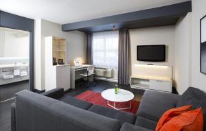 TV a/nebo společenská místnost v ubytování Hotel Sepia