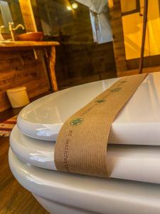 a towel is sitting on top of a bath tub at TERRA - Saturnia tented lodges in Saturnia