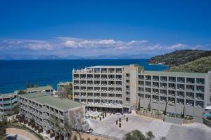 an aerial view of a hotel and the ocean at Kairaba Mythos Palace - Adults Only in Mesongi