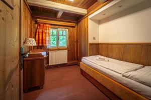Postel nebo postele na pokoji v ubytování Hotel Sluníčko + 37 fotografií