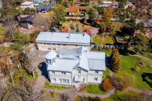 an aerial view of a large house with a roof at Villa Ostmala in Ventspils