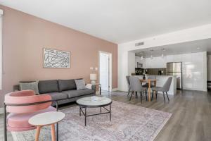 a living room with a couch and chairs and a table at Mountain View 2br w bbq lounge roof nr shops SFO-1417 in Los Altos