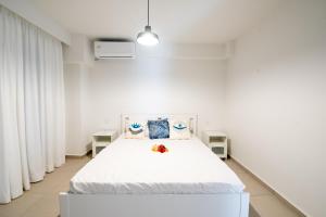 Postel nebo postele na pokoji v ubytování Ennea suites-Space suite
