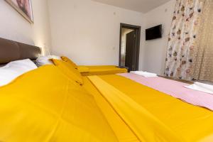Postel nebo postele na pokoji v ubytování APARTEMENT VIVA