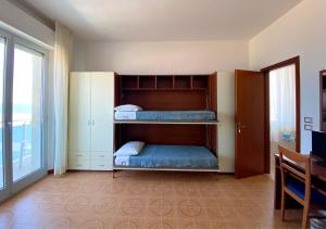 Кровать или кровати в номере Hotel Sayonara