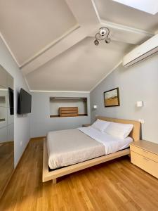 Кровать или кровати в номере Sweet Home Desiree