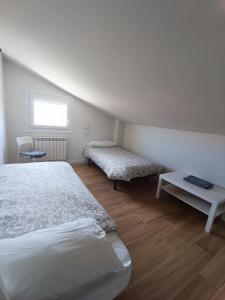 Posteľ alebo postele v izbe v ubytovaní La Rinconada