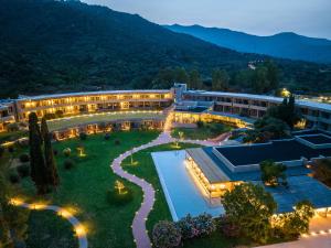 an aerial view of a resort at night at Is Molas Resort in Pula