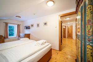 Postel nebo postele na pokoji v ubytování Hotel Sepetná