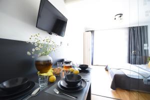Postel nebo postele na pokoji v ubytování Apartament Przemiły - Studio Tęczowe Wzgórze