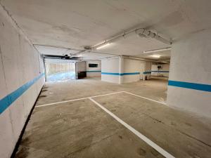 an empty parking garage with a basketball court in it at Balnea O Pazo in Mondariz-Balneario