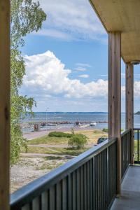 a view of the beach from the porch of a house at RS Noatun in Horten