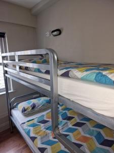 Ліжко або ліжка в номері Bru Bar & Hostel