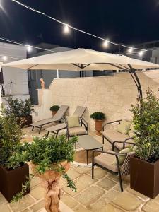Patio nebo venkovní prostory v ubytování Incentro Domus