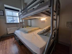 Ліжко або ліжка в номері Bru Bar & Hostel