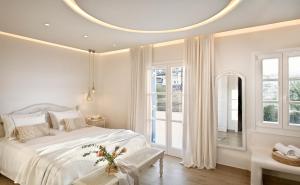 Cama ou camas em um quarto em Erato Hotel Mykonos