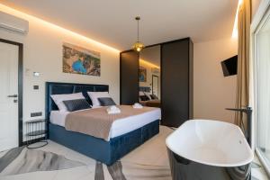 Ένα ή περισσότερα κρεβάτια σε δωμάτιο στο Luxury Villa Hedonica +32 φωτογραφίες